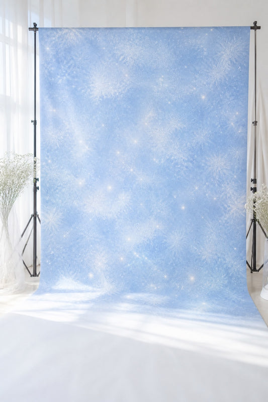 Icy Blue Snow Sparkle photography backdrop displayed on a stand